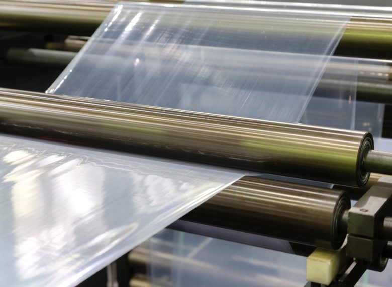 Roll,Of,Plastic,Packaging,Film,On,The,Automatic,Packing,Machine